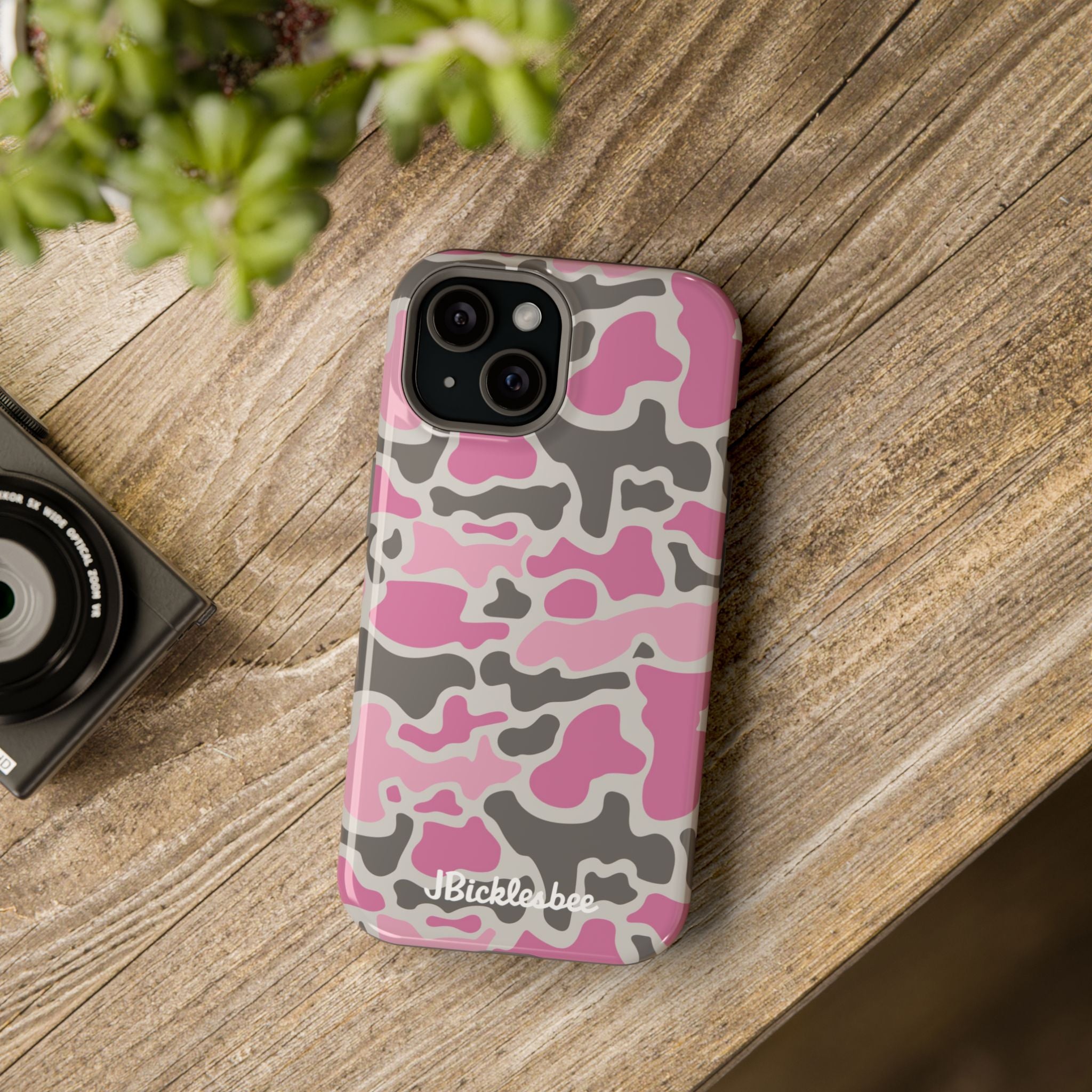 Pink Retro Duck Camo MagSafe iPhone Case on table