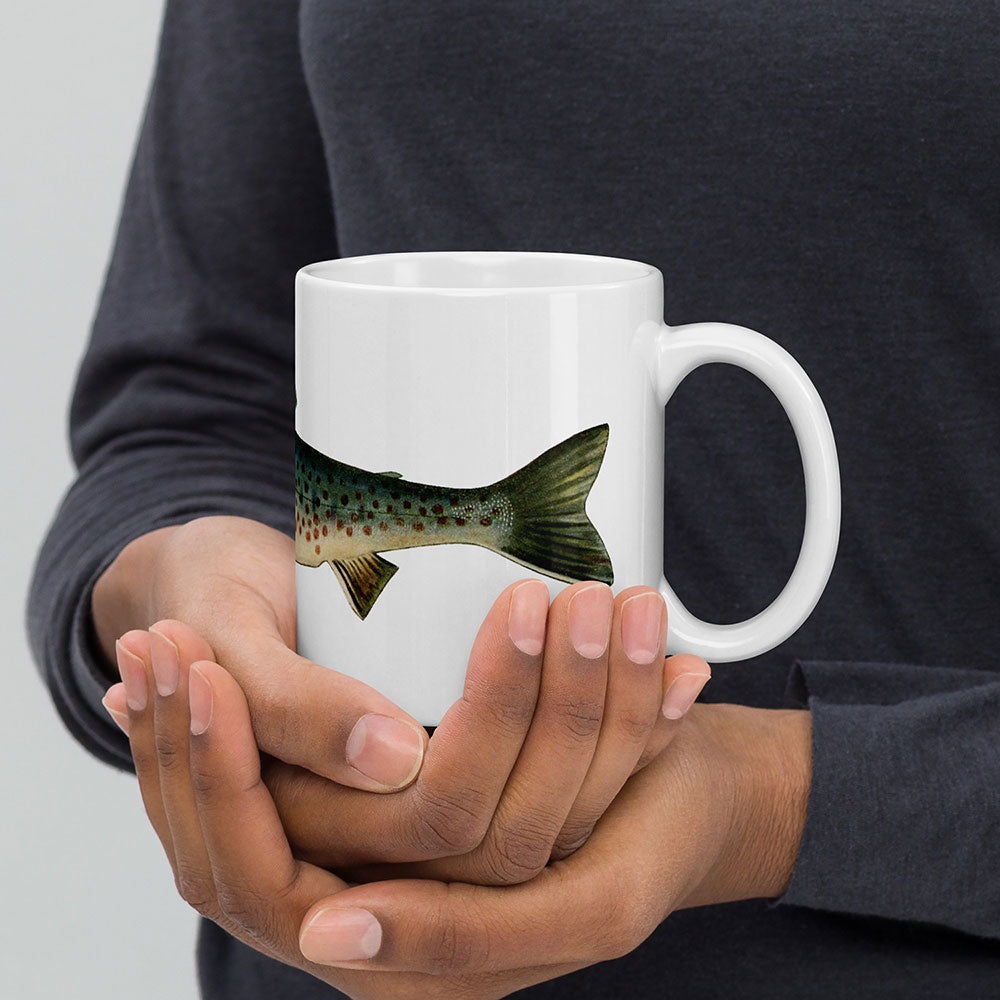 rangeley trout coffee mug in hand