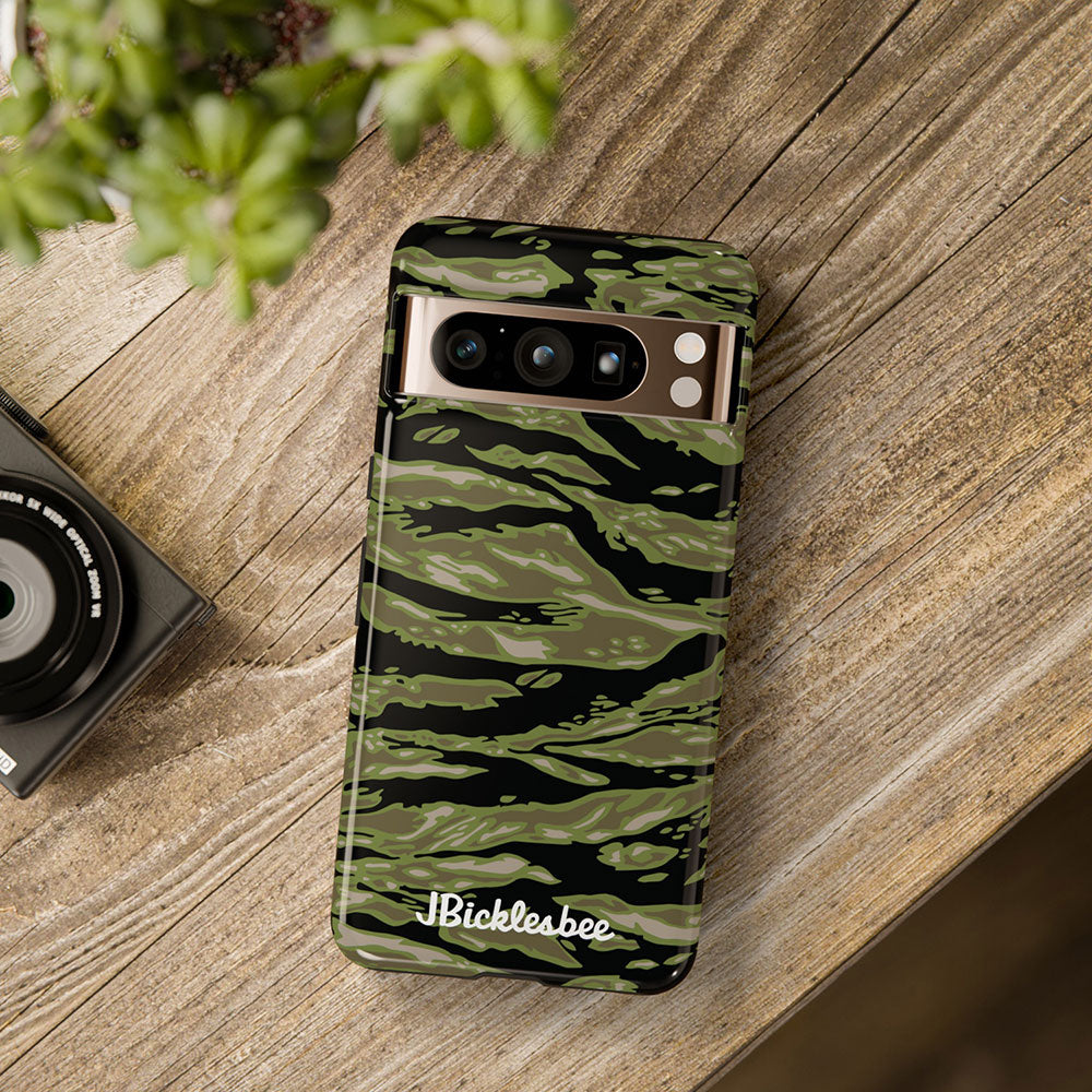 Retro Woodland Camo Tiger Stripe Pixel Tough Case on table