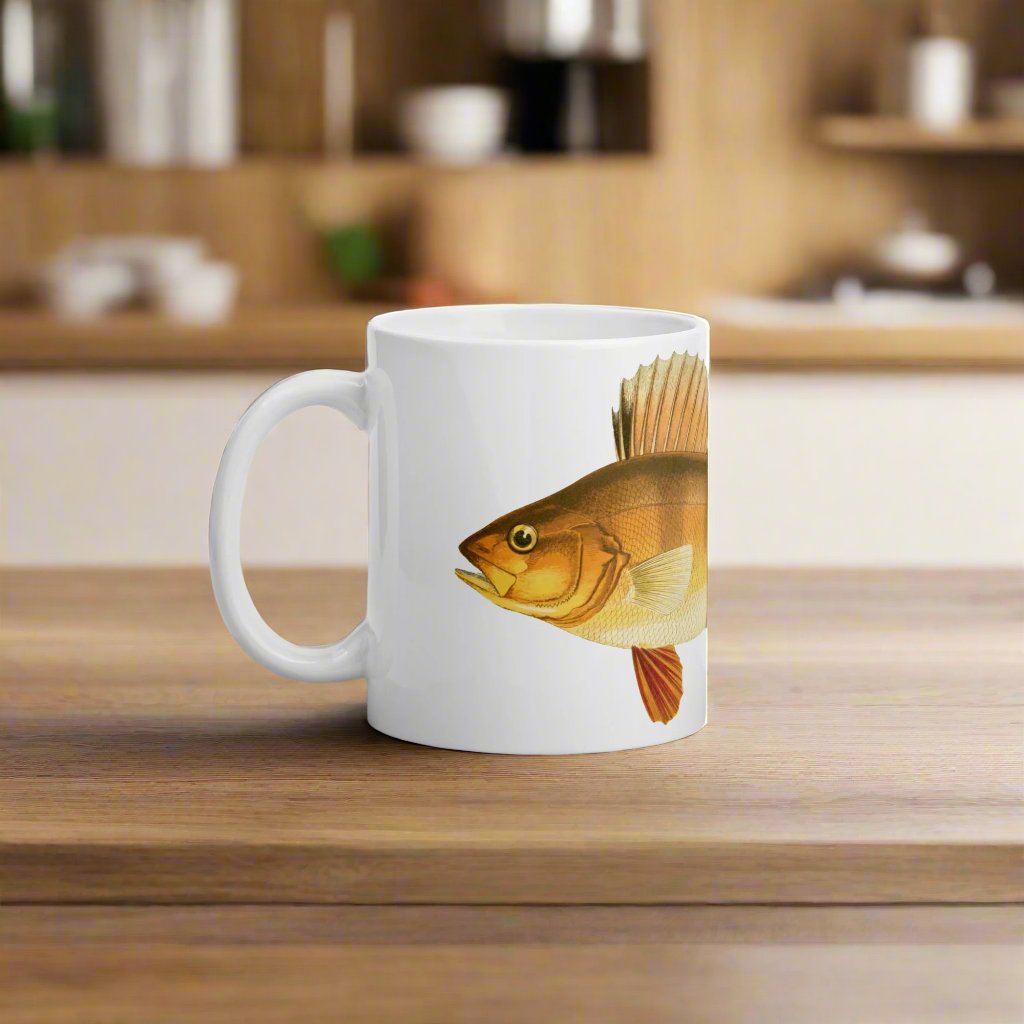 yellow perch coffee mug on a table